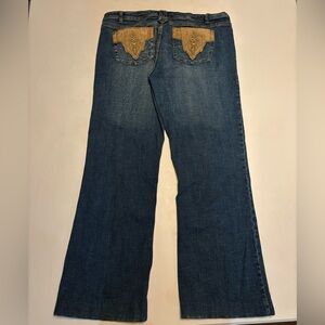 Embroidered dagger flared jeans